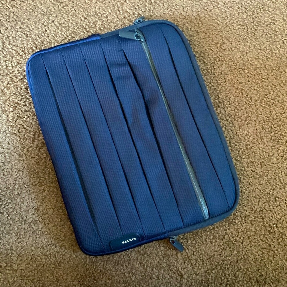 Belkin cover. Very clean I believe it was never used